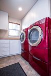Washer and Dryer in the house with ample cabinet space if needed